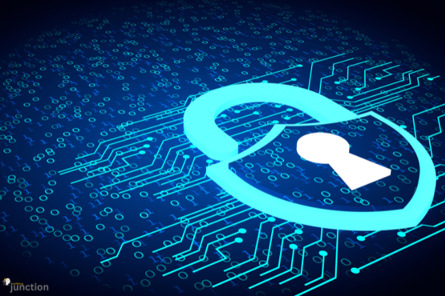 Digital graphic of a bright blue shield and padlock overlaying a circuit board and binary code, representing the high security and data protection features of TimeWarp TaskUs.